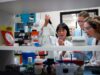 Ascidian Therapeutics Appoints Daniel Rosan President as RNA Editing Biotech Begins CEO Search Scientist working at a bench in a biotechnology research laboratory