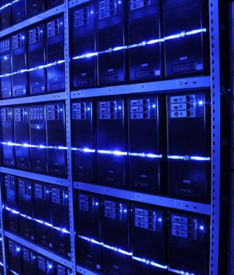 Databarracks Appoints Darren Tingley as Services and Technology Director Data center server room, illustrating managed data protection and business resilience services