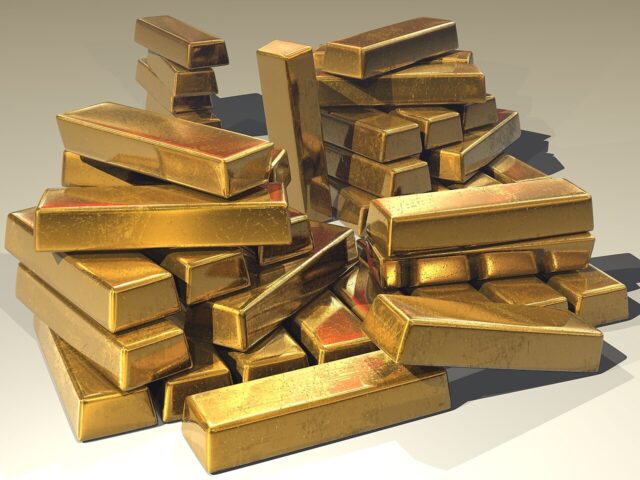 em-18262-gold-bullion-bars-jpg Gold bullion bars, representing the gold mining sector
