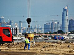 Big 5 Global 2026 Returns to Dubai World Trade Centre for the Region’s Largest Construction Gathering Construction cranes and workers on a Dubai building site