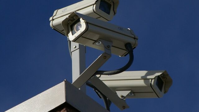 Surveillance cameras mounted on a building