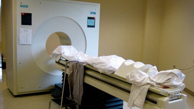 MRI scanner in a hospital imaging suite MRI scanner in a hospital imaging suite