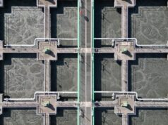ACWA Power Signs 478 Million Dollar Dubai Desalination Water Purchase Agreement With DEWA Aerial view of a water treatment facility, illustrating the desalination sector