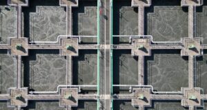 ACWA Power Signs 478 Million Dollar Dubai Desalination Water Purchase Agreement With DEWA Aerial view of a water treatment facility, illustrating the desalination sector