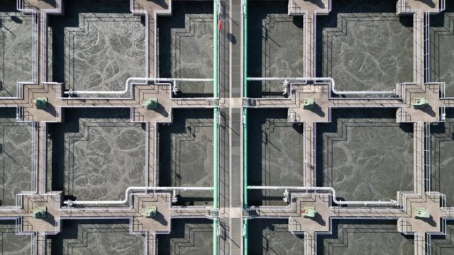 Aerial view of a water treatment facility, illustrating the desalination sector