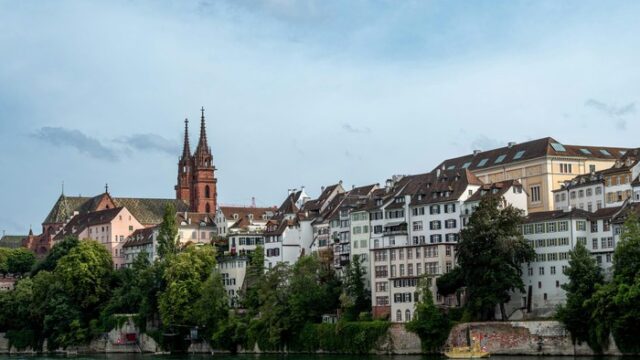 The Rhine riverfront and Basel Minster in Switzerland