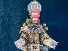 Caribbean Energy Week Returns to Georgetown for Its Next Edition Aerial view of an offshore oil and gas production platform in open water