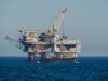 ADES Holding signs SAR 173m jack-up contract with Indonesia’s Pertamina Hulu Mahakam Offshore oil and gas platform standing in open blue sea under clear daylight, a generic illustration for an offshore jack-up drilling contract report.