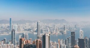 HKMA Names Twelve Offshore Renminbi Primary Liquidity Providers and Lifts Repo Facility to 22 Billion Yuan Hong Kong harbour and the island skyline