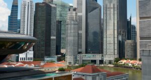 Malaysian and Thai central banks join Singapore led initiative on cross border digital money settlement The Singapore central business district above the Singapore River