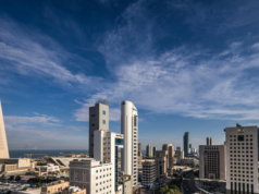 Kuwait Facilities Management Conference Books the Radisson Blu Hotel for Its Second Edition Office and residential towers in the Sharq district of Kuwait City photographed in daylight