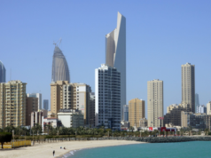 Kuwait College of Science and Technology Hosts the Third Assistive Technologies for Special Needs Forum The Kuwait City waterfront and high rise skyline photographed on a clear day
