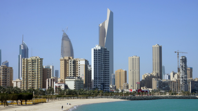 The Kuwait City waterfront and high rise skyline photographed on a clear day