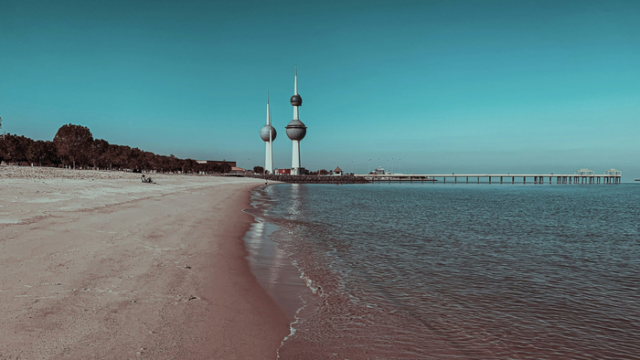 kuwait-towers-shoreline-daylight-gold-jewellery Kuwait Towers seen from the shoreline on Arabian Gulf Street in daylight